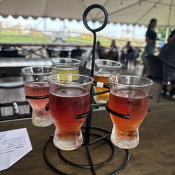 Flight of ciders, whiskey and vodka.