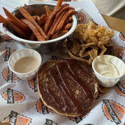 Bison Berger with BBQ sauce and sweet potato fries. Garlic mayo on the side! Bison Berger with BBQ sauce and sweet potato fries. Garlic mayo on the side!