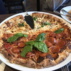 Italianni's - Pizza - very large; good tasting but be aware that the cheese pizza has bleu cheese in it.