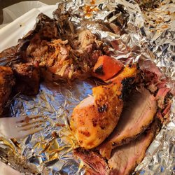 Top Dogg BBQ SmokeHouse - The $38.00 sampling plate in progress. This box served 4 people in my party.