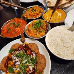 Aloo tikki with chana masala, paneer and chicken Tikka masala, chicken vindaloo and lamb korma. All amazing