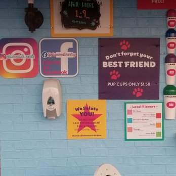 Pelican’s SnoBalls - Front outside wall decor with April 2021 hours 4/13/2021. 19:45 PM - Shaved Ice Near Me - Marietta, Georgia