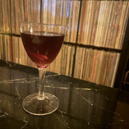 Round Midnight - a spin on the Black Manhattan.  This cocktail is a must-try for whiskey cocktail lovers.
