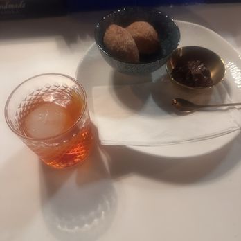 Cattle Call - The "Pochinki" that should be called ponchiki, a Russian fried pastry with cream but in this case with ricotta - Wine Bars Near Me - Omaha, Nebraska