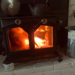 Weaverville Glass & Son - Teddy fixed my wood stove glass (right side). Looks great