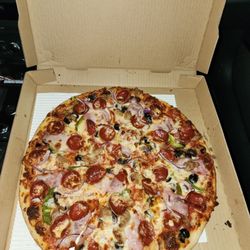 Calixtos Pizza - Great crust, perfect amount of sauce and all around well balanced flavor.