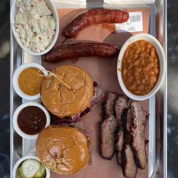 OAK'D BBQ - The Governor sandwich, Rosewood Wagyu Brisket, Sausage Links (Garlic-Black Pepper), Central Texas BBQ Beans, and the Red Skin Potato Salad. - Barbeque Near Me - Dallas, Texas OAK'D BBQ - The Governor sandwich, Rosewood Wagyu Brisket, Sausage Links (Garlic-Black Pepper), Central Texas BBQ Beans, and the Red Skin Potato Salad. - Barbeque Near Me - Dallas, Texas