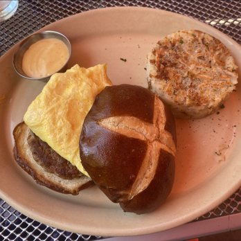 Snooze, an A.M. Eatery - Sausage sandwich on pretzel bun - Breakfast & Brunch Near Me - Phoenix, Arizona Snooze, an A.M. Eatery - Sausage sandwich on pretzel bun - Breakfast & Brunch Near Me - Phoenix, Arizona
