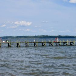 Maryland State Government-Greenwell State Park - People fishing on the pier on the Patuxent in Greenwell State Park