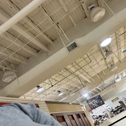 Ibiley Uniforms & More - The stick you see from the ceiling down is where leaks into a bucket.