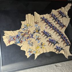 Abreu Gallery Picture Framers - Beadwork on hide framed at Abreu. Tom's work is second only to the art itself!