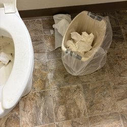 Our House Senior Living - Eau Claire - Urine on floor and trash on floor.