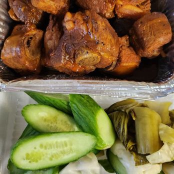 Huong - Caramelized pork spare ribs. It came with complimentary cucumbers and pickled mustard greena. - Vietnamese Near Me - Santa Ana, California Huong - Caramelized pork spare ribs. It came with complimentary cucumbers and pickled mustard greena. - Vietnamese Near Me - Santa Ana, California