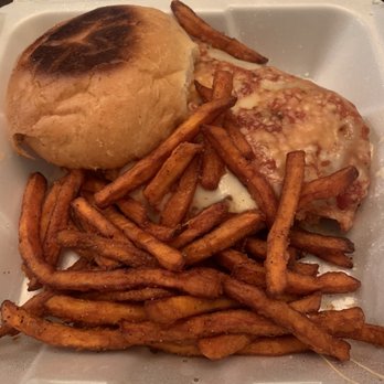 The Office Bar & Kitchen - Chicken Parmesan sandwich with sweet potato fries, $10.99 - Sports Bars Near Me - Castle Rock, Colorado