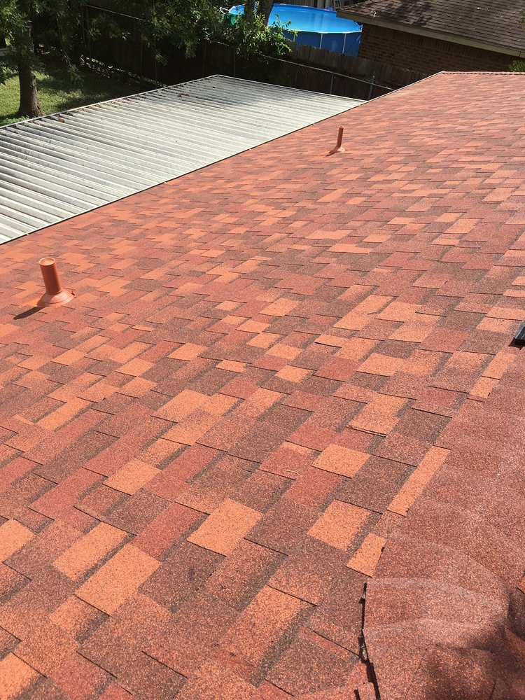 Slide of Monumental Roofing Services