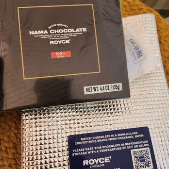 ROYCE Chocolate - They give you a little ice pack and insulated bag to keep chocolate cool during transit. - Candy Stores Near Me - Duluth, Georgia ROYCE Chocolate - They give you a little ice pack and insulated bag to keep chocolate cool during transit. - Candy Stores Near Me - Duluth, Georgia