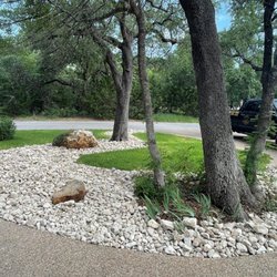 Grizzly's Hidden Falls Nursery & Landscaping - Simple river bed with boulders