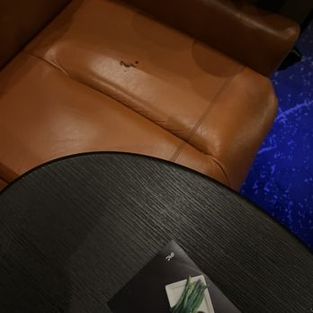 IPIC Theaters - Dirty seat and table - Cinema Near Me - Atlanta, Georgia IPIC Theaters - Dirty seat and table - Cinema Near Me - Atlanta, Georgia