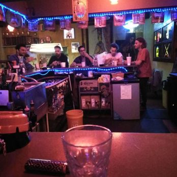 Polly's Pub - a glass of water on the bar - Pubs Near Me - Amarillo, Texas