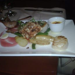 Sharing platter appetizer - 2 big scallops, quail wrapped in bacon with cherry sauce, butternut squash brule, crusted halibut Sharing platter appetizer - 2 big scallops, quail wrapped in bacon with cherry sauce, butternut squash brule, crusted halibut