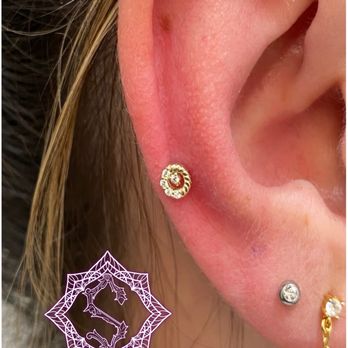 Metropolis Tattoo & Piercing - Helix piercing by Steven - Tattoo Near Me - San Diego, California Metropolis Tattoo & Piercing - Helix piercing by Steven - Tattoo Near Me - San Diego, California