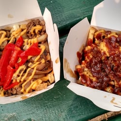 Smoke's Poutinerie - Bbq bacon mac n cheese on left, philly cheesesteak on right