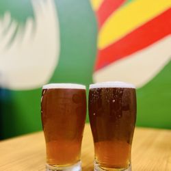 Rockyaad Jamaican Restaurant - Beers on tap with the beautiful mural in the back.