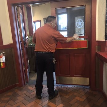 Spring Creek Barbeque - Manager doing extra cleaning - Barbeque Near Me - Mesquite, Texas