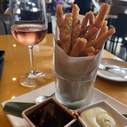 Sweet potato fries and a glass of rose...life's good Sweet potato fries and a glass of rose...life's good