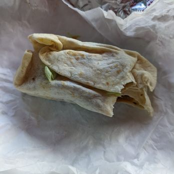 El Nopal - This is their carne asada burrito. It was fine. But it's not wrapped right. - Mexican Near Me - Dover, Delaware