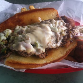 Our Deck Down Under - Steak sandwich with onions and peppers. - Seafood Near Me - Port Orange, Florida Our Deck Down Under - Steak sandwich with onions and peppers. - Seafood Near Me - Port Orange, Florida