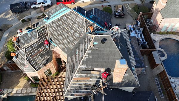 Ellie Roofing and Remodeling Logo