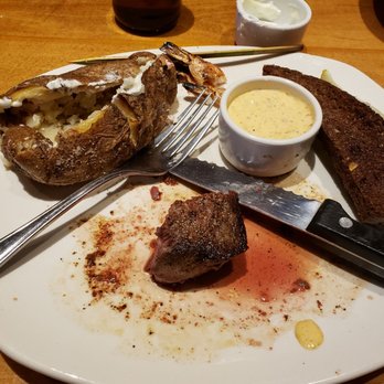 Outback Steakhouse - low 60's and having the doors open wide with a 20 mph wind think the food was ok but I couldn't really tell, the bartender was nice - Steakhouses Near Me - Amherst, New York Outback Steakhouse - low 60's and having the doors open wide with a 20 mph wind think the food was ok but I couldn't really tell, the bartender was nice - Steakhouses Near Me - Amherst, New York