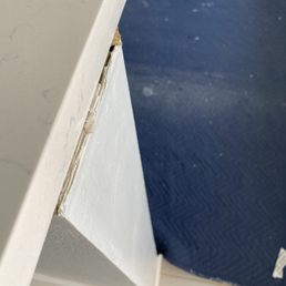 The end of the counter. Should hang OVER the wall. The end of the counter. Should hang OVER the wall.