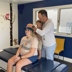 Evolution Chiropractic - Assessment and adjustment for pregnant momma.
