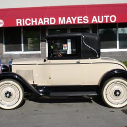 Richard's 1927 Chevrolet. It's been in the family for years. Our Logo, and here at the shop, still in pristine condition!