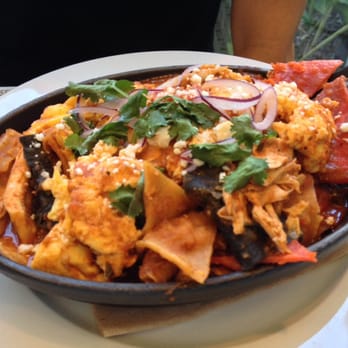 FIG Restaurant - Chilaquiles $18.00 (Crispy Tortillas, Scrambled Eggs, Chicken Salsa Roja, Queso Fresco) - Bars Near Me - Santa Monica, California FIG Restaurant - Chilaquiles $18.00 (Crispy Tortillas, Scrambled Eggs, Chicken Salsa Roja, Queso Fresco) - Bars Near Me - Santa Monica, California