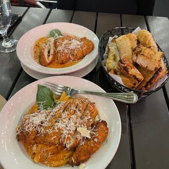 Coppola's East - Coppola's Famous Penne alla Vodka, Angel hair alla vodka both with breaded chicken and Garlic Bread - Italian Near Me - New York, New York