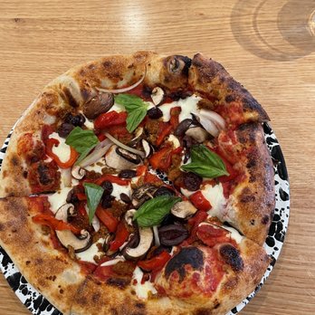 The River Coffeehouse - a pizza on a paper plate - Coffee & Tea Near Me - Winona Lake, Indiana The River Coffeehouse - a pizza on a paper plate - Coffee & Tea Near Me - Winona Lake, Indiana