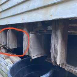 Marquette House - No support . Just hanging there.