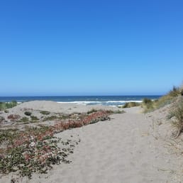 Sand path opens up to the beach. Sand path opens up to the beach.