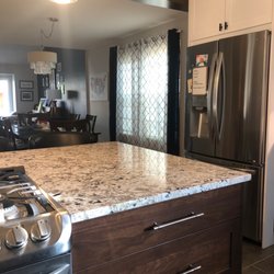 Sherwin-Williams Paint Store - Exposed beams stained to match new kitchen cabinets.
