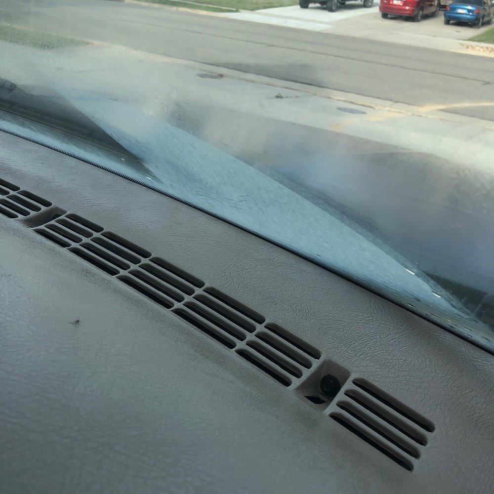 Inside windshield. Greasy spray