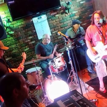 Hilltop Tavern - a group of people playing music - Dive Bars Near Me - Lodi, New Jersey