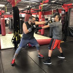 Juan M learning the proper way to throw a jab.