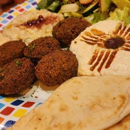 Vegetarian platter and Himalayan Tea. Shrimp and Lamb Kabobs with rice are not present in the picture but are very delicious.