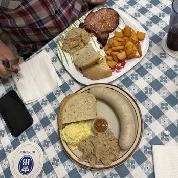 Continental Deli - I had the weisswurst, and he had the pork chop. Delicious! - Delis Near Me - La Habra, California
