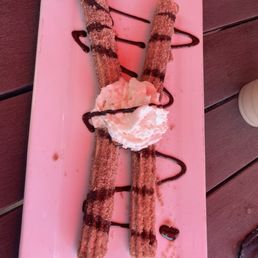 Churros are really good. The Breakfast Burrito Americano was good too!!! Great food and good service!