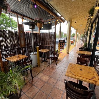 Quebobs Restaurant - a patio with tables and chairs - Mediterranean Near Me - Los Angeles, California Quebobs Restaurant - a patio with tables and chairs - Mediterranean Near Me - Los Angeles, California