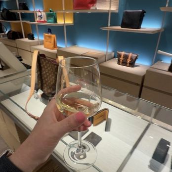 Louis Vuitton Honolulu Gump's Building - Wine with your purchase - Leather Goods Near Me - Honolulu, Hawaii